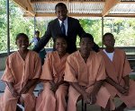 Chaplain Kaneil Williams and baptismal candidates