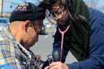Woman with stethoscope