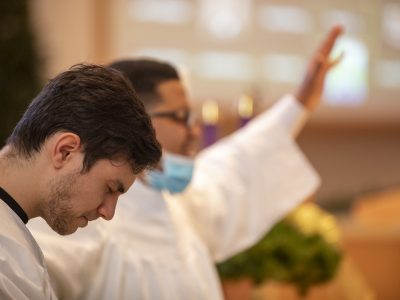 Rodrigo Lima praying in preparation for baptism.